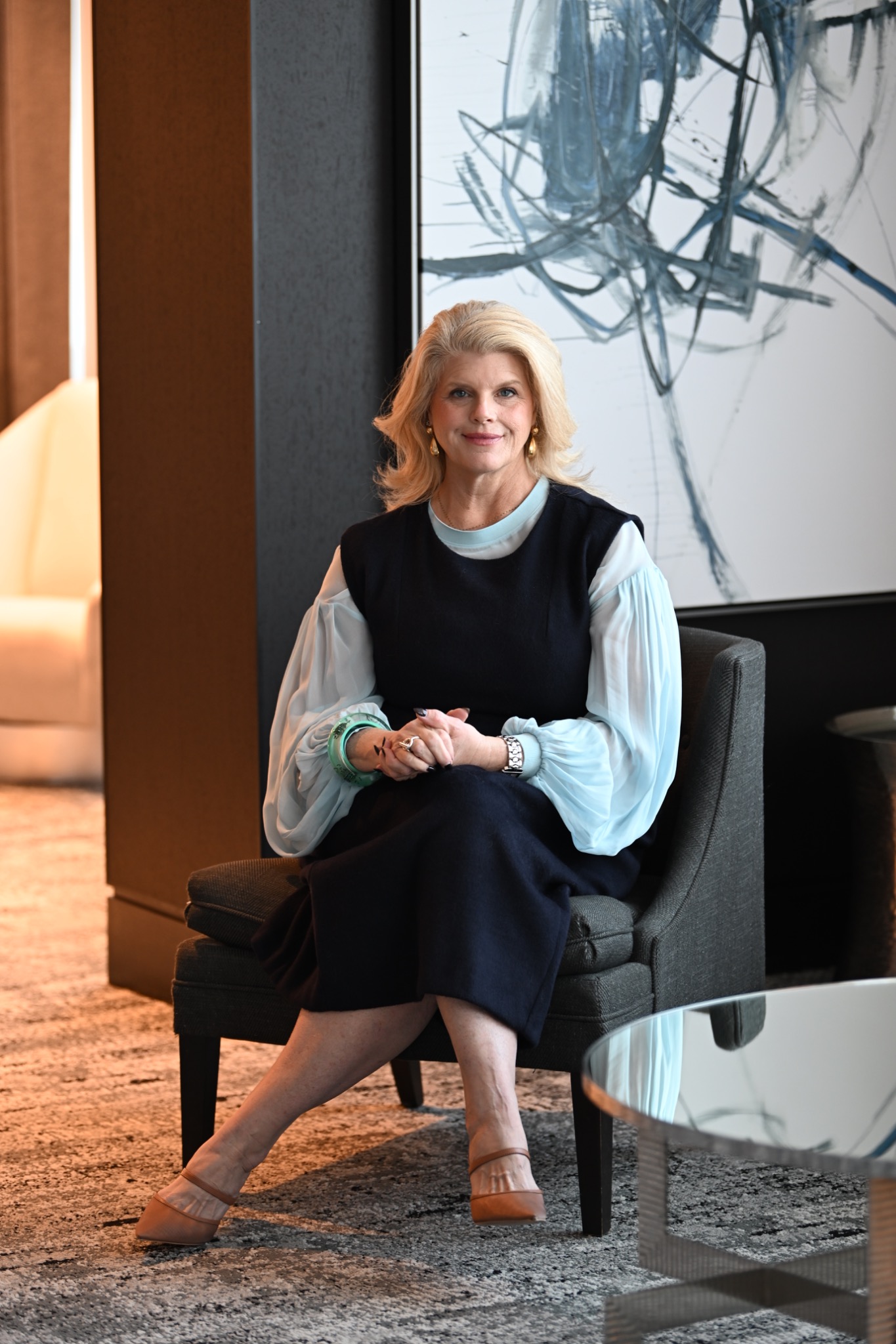 Pam Troxel seated in a contemporary interior